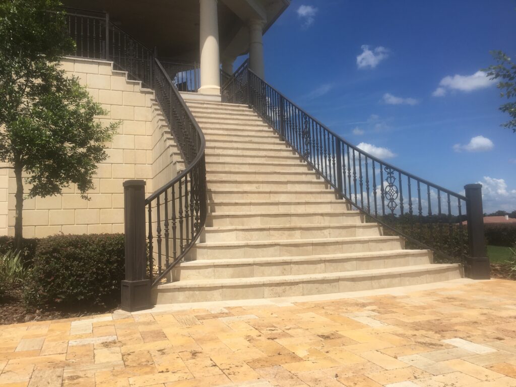 Grand staircase metal railing design